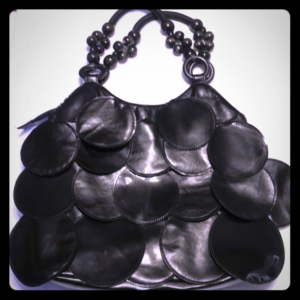 Unbranded manmade material and patent leather